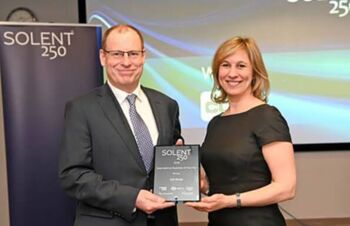 CEO Mark Oliver receiving the International Business of the Year award